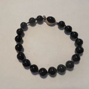 Vintage hand knotted black glass bracelet